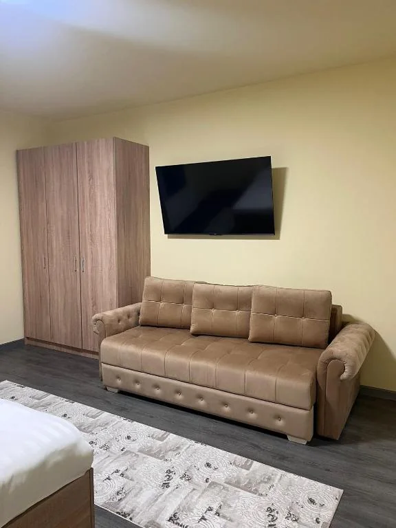 Livingul · canapea extensibilă — Deluxe de 70 m²